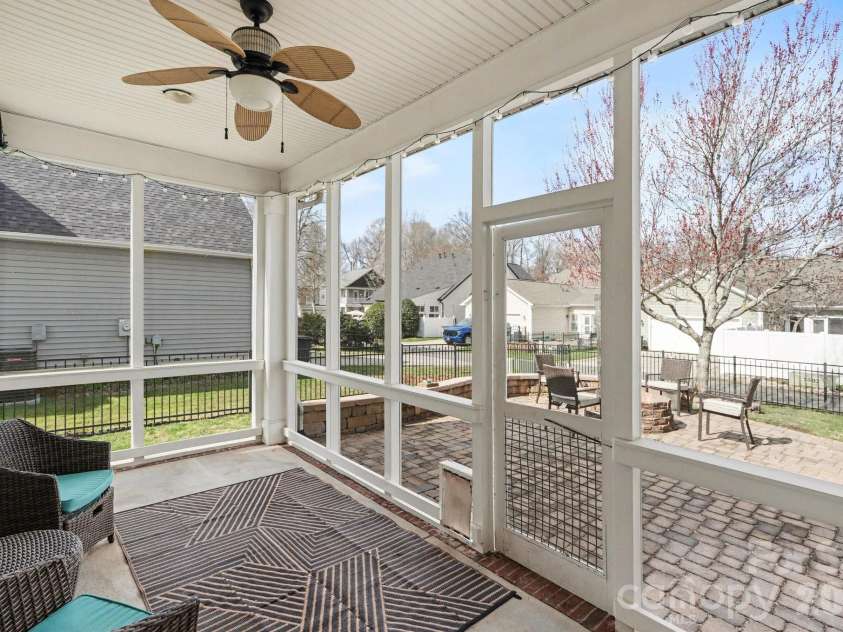 3010 Triple Crown Drive, Indian Trail, NC 28079.  MLS# CAR4354040, YatesRealty ID 13497. Screened porch