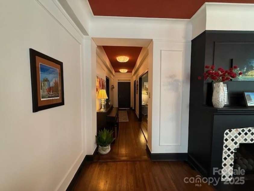 301 10th Street, Charlotte, NC 28202.  MLS# CAR4299886, YatesRealty ID 13498. Looking from Living Room down hallway to front door of unit.