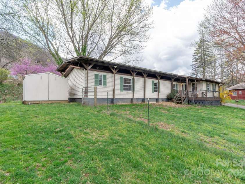 51 Ferguson Lane, Maggie Valley, NC 28751.  MLS# CAR4242031, YatesRealty ID 13499. Fenced yard - porch with a view