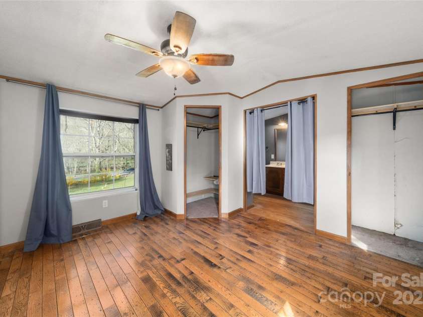 51 Ferguson Lane, Maggie Valley, NC 28751.  MLS# CAR4242031, YatesRealty ID 13499. Primary bedroom