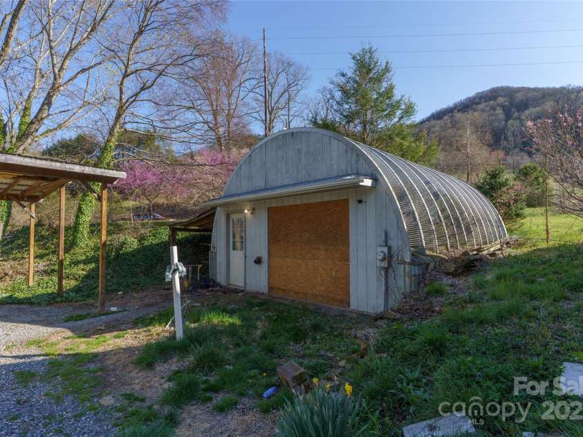 51 Ferguson Lane, Maggie Valley, NC 28751.  MLS# CAR4242031, YatesRealty ID 13499. Quonset Hut workshop storage