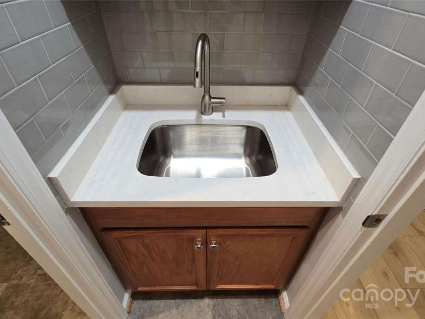 1308 Princeton Avenue, Gastonia, NC 28054.  MLS# CAR4205826, YatesRealty ID 1350. Sink in Laundry