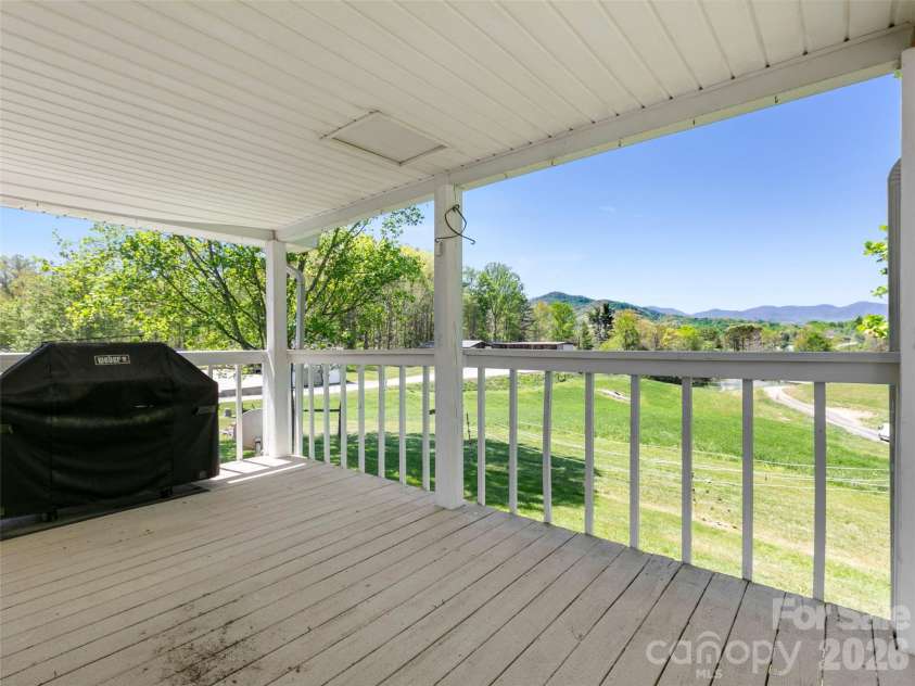60 Dix Creek Chapel Road, Asheville, NC 28806.  MLS# CAR4369677, YatesRealty ID 13501. Rear Covered Deck