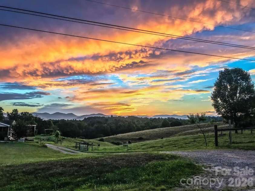 60 Dix Creek Chapel Road, Asheville, NC 28806.  MLS# CAR4369677, YatesRealty ID 13501. Rear Sunset View