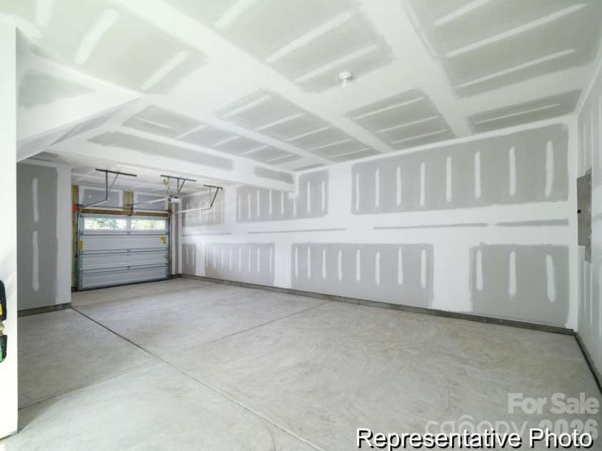 11805 Avocet Street, Charlotte, NC 28215.  MLS# CAR4371772, YatesRealty ID 13504. Oversized Tandem Garage