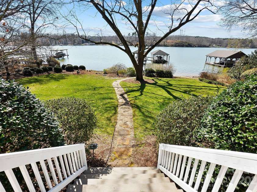 6403 Amos Smith Road, Charlotte, NC 28214.  MLS# CAR4233233, YatesRealty ID 13507. Beautifully landscaped, level yard equipped with landscape lighting is perfect for entertaining