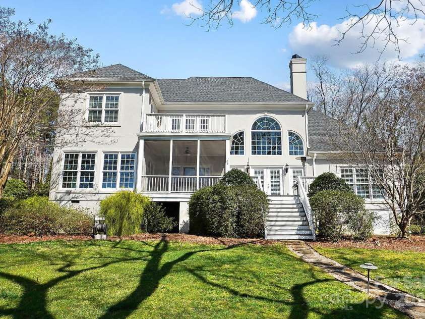 6403 Amos Smith Road, Charlotte, NC 28214.  MLS# CAR4233233, YatesRealty ID 13507. Embrace the outdoor lifestyle on the spacious balcony, unwind in the fabulous screened porch, or host unforgettable gatherings on the back deck