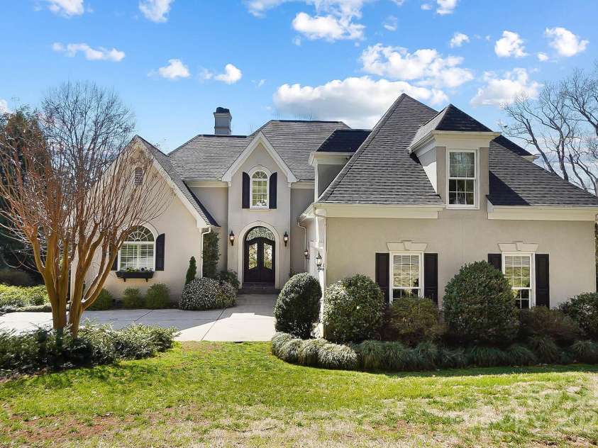 6403 Amos Smith Road, Charlotte, NC 28214.  MLS# CAR4233233, YatesRealty ID 13507. Step into a world of unparalleled luxury at this magazine-worthy lakefront estate, a true masterpiece on the shores of Lake Wylie