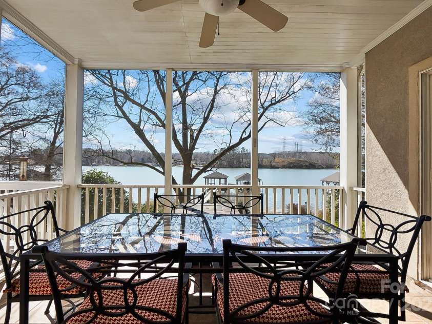 6403 Amos Smith Road, Charlotte, NC 28214.  MLS# CAR4233233, YatesRealty ID 13507. Unwind in the fabulous screened porch