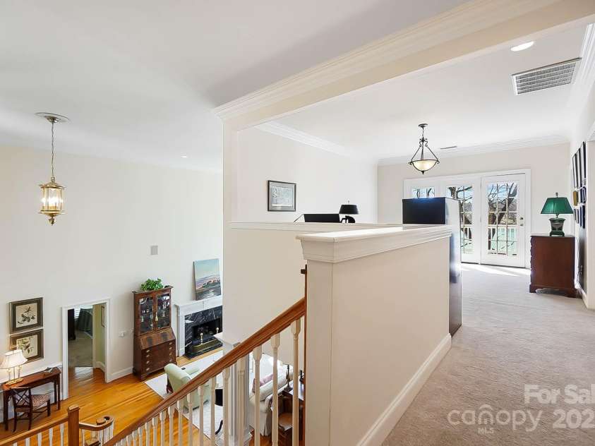 6403 Amos Smith Road, Charlotte, NC 28214.  MLS# CAR4233233, YatesRealty ID 13507. Upstairs, an expansive loft provides a versatile space, while 2 BRs & huge bonus room w/ full bath offer ample accommodations for guests or family