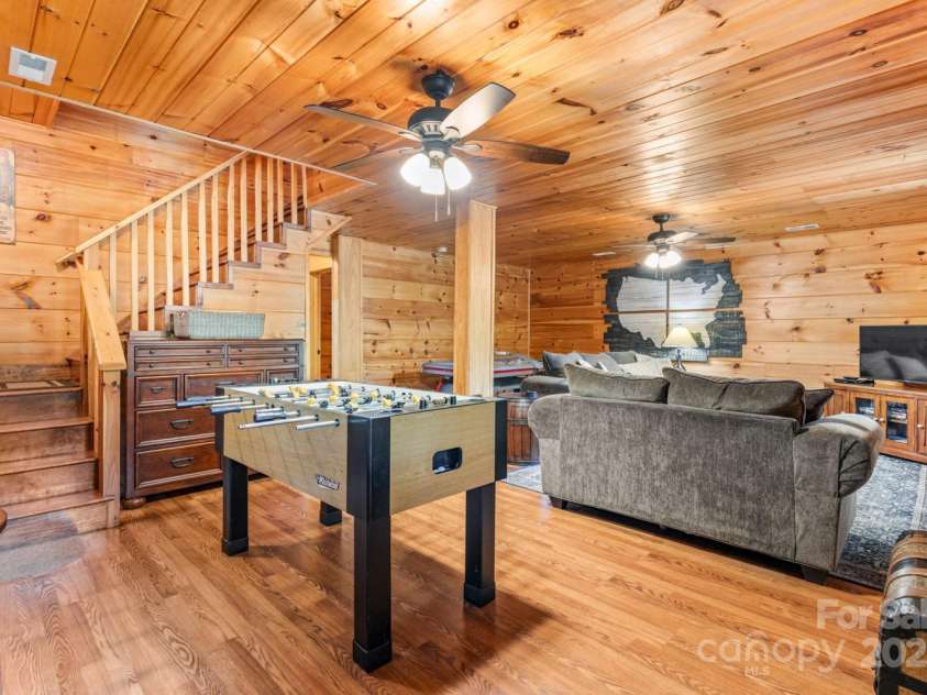 28 Upper Ridge Road, Black Mountain, NC 28711.  MLS# CAR4274380, YatesRealty ID 1351. Additional recreational and entertaining space at 28 Upper Ridge
