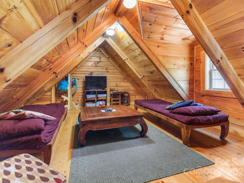 28 Upper Ridge Road, Black Mountain, NC 28711.  MLS# CAR4274380, YatesRealty ID 1351. Lofted sleeping space at 26 Upper Ridge