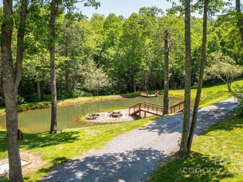 28 Upper Ridge Road, Black Mountain, NC 28711.  MLS# CAR4274380, YatesRealty ID 1351. Pond on property with outdoor enteraining space, and recreation sites! 