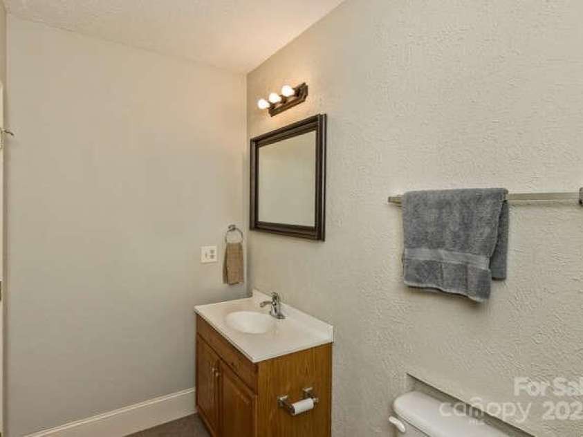 16 Devonshire Drive, Mills River, NC 28759.  MLS# CAR4245659, YatesRealty ID 13513. Lower level bath (4)