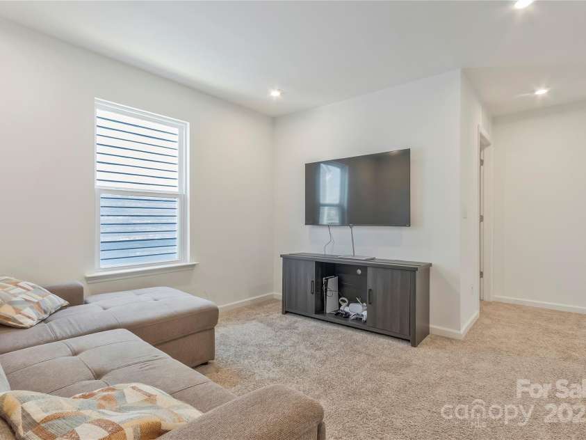 14224 Canemeadow Drive, Charlotte, NC 28278.  MLS# CAR4246314, YatesRealty ID 13517. Loft area... great for movie night. could be used a second office space