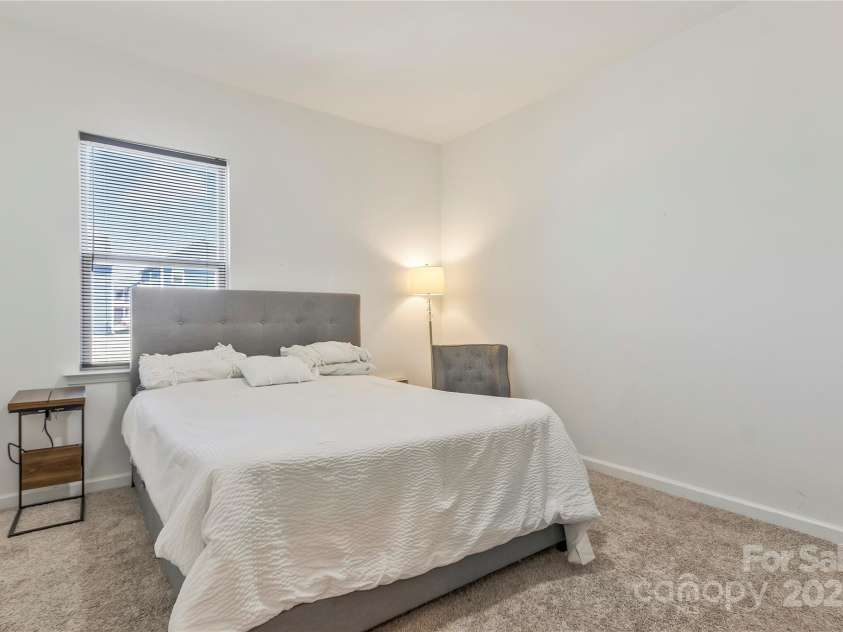 14224 Canemeadow Drive, Charlotte, NC 28278.  MLS# CAR4246314, YatesRealty ID 13517. Spacious guest bedroom on the main with huge walk-in closet.