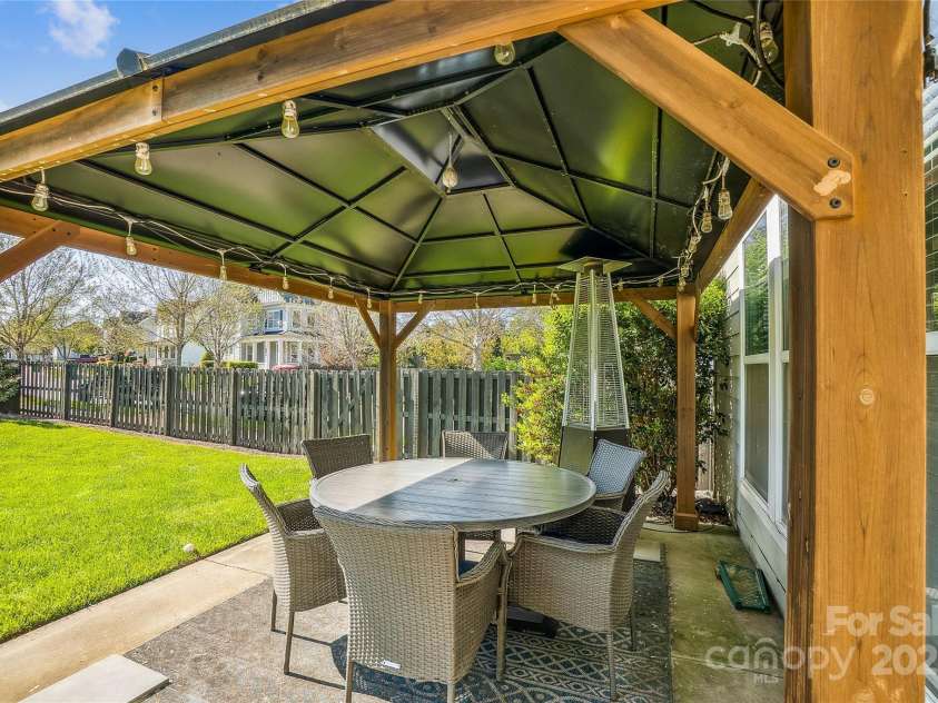 15402 Country Lake Drive, Pineville, NC 28134.  MLS# CAR4242493, YatesRealty ID 13518. Back patio