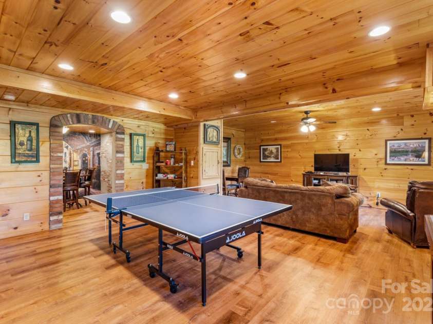 26 Upper Ridge Road, Black Mountain, NC 28711.  MLS# CAR4274378, YatesRealty ID 1352. Bonus entertainment space at 24 Upper Ridge