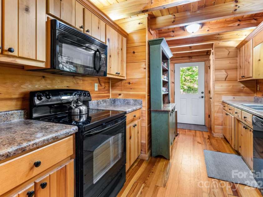 26 Upper Ridge Road, Black Mountain, NC 28711.  MLS# CAR4274378, YatesRealty ID 1352. Exterior access off kitchen in 26 Upper Ridge. 