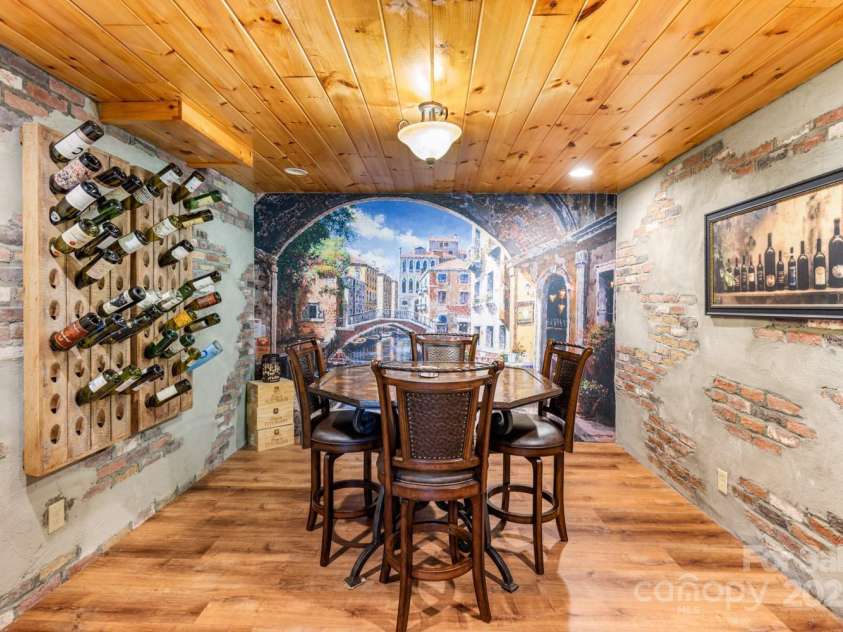 26 Upper Ridge Road, Black Mountain, NC 28711.  MLS# CAR4274378, YatesRealty ID 1352. Wine room at 24 Upper Ridge