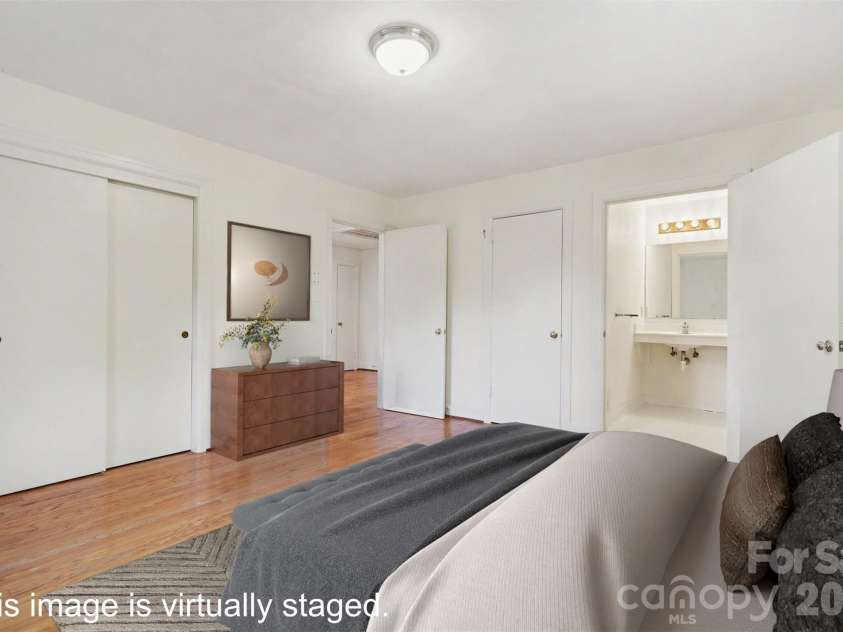 804 Phillips Street, Shelby, NC 28150.  MLS# CAR4367322, YatesRealty ID 13526. The primary bedroom has 2 closets and an attached accessible bathroom. *Virtually staged photo*