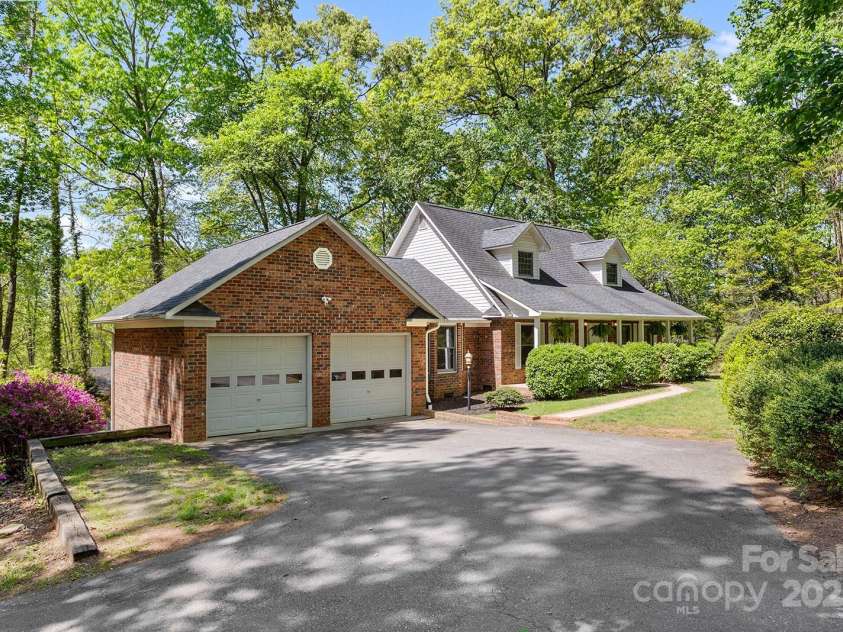 133 Bennett Road, Candler, NC 28715.  MLS# CAR4259919, YatesRealty ID 13529. 
