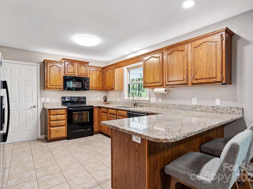 133 Bennett Road, Candler, NC 28715.  MLS# CAR4259919, YatesRealty ID 13529. 