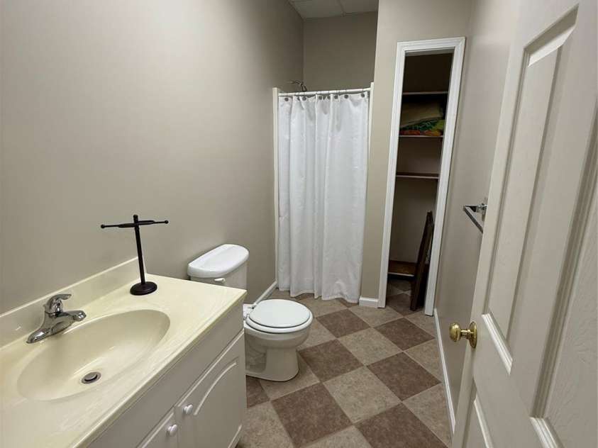 357 Lentz Landing Lane, Nebo, NC 28761.  MLS# CAR4351177, YatesRealty ID 13536. Downstairs bathroom