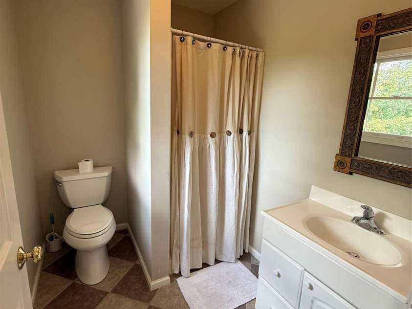 357 Lentz Landing Lane, Nebo, NC 28761.  MLS# CAR4351177, YatesRealty ID 13536. Upstairs bath