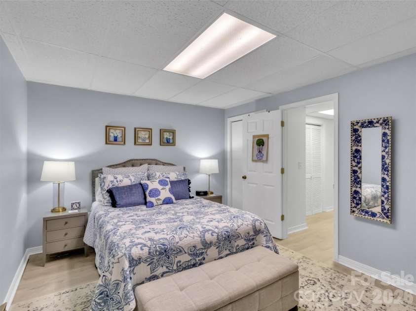 211 Rustic Road, Waynesville, NC 28786.  MLS# CAR4371760, YatesRealty ID 13537. Lower Level Guest Bedroom