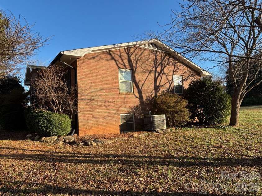 150 Old Georgia Road, Statesville, NC 28625.  MLS# CAR4324519, YatesRealty ID 1354. Side view
