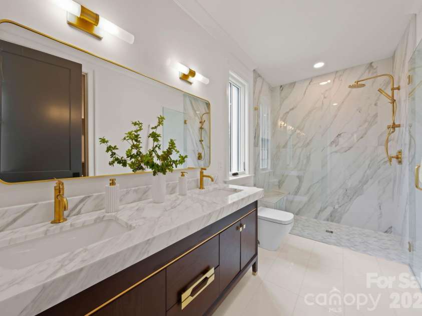 2208 Overhill Road, Charlotte, NC 28211.  MLS# CAR4360922, YatesRealty ID 13542. Each bath has a designer unique look