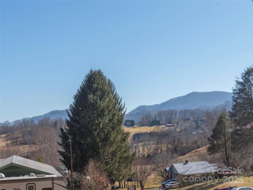 303 Miami Drive, Waynesville, NC 28785.  MLS# CAR4220440, YatesRealty ID 13546. 