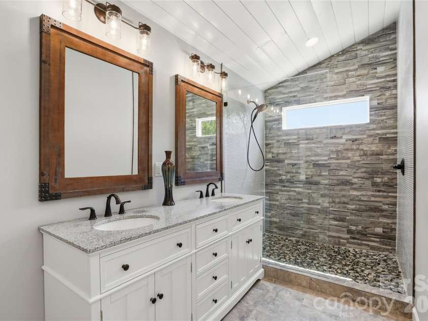 19011 Kailua Circle, Tega Cay, SC 29708.  MLS# CAR4367824, YatesRealty ID 13553. Primary bath with dual vanities and walk-in shower