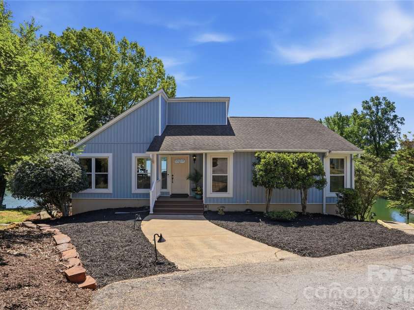19011 Kailua Circle, Tega Cay, SC 29708.  MLS# CAR4367824, YatesRealty ID 13553. Tega Cay waterfront home with stunning main channel views! 