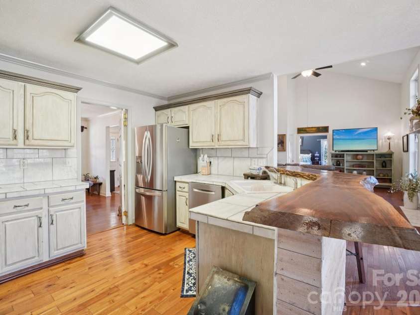 4005 Little River Road, Hendersonville, NC 28739.  MLS# CAR4352423, YatesRealty ID 13556. 