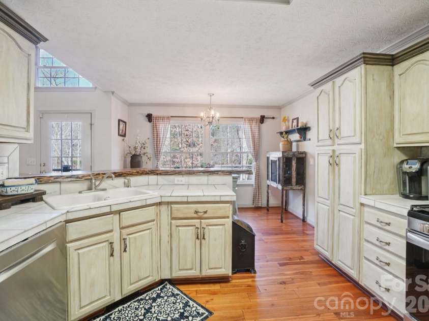 4005 Little River Road, Hendersonville, NC 28739.  MLS# CAR4352423, YatesRealty ID 13556. 