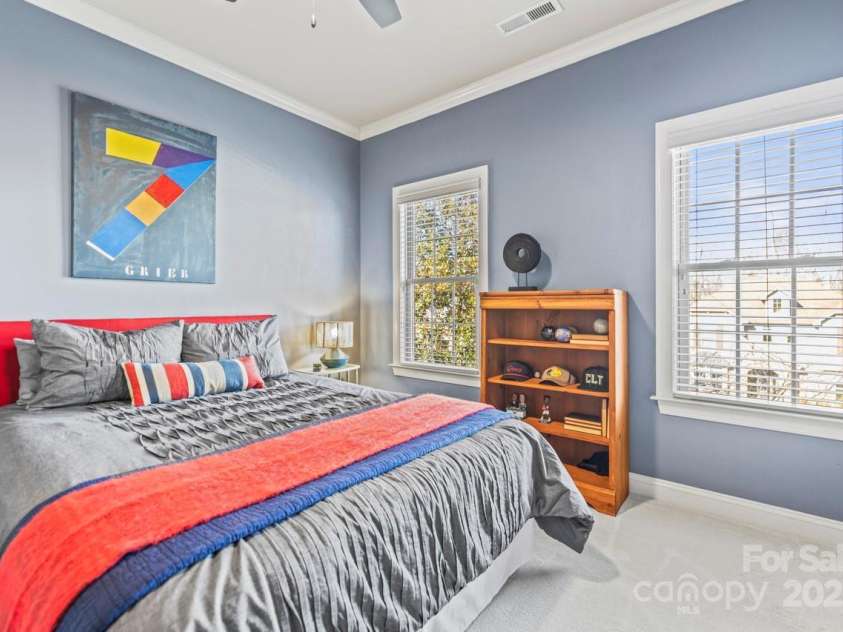 7812 Burning Ridge Drive, Stanley, NC 28164.  MLS# CAR4222932, YatesRealty ID 1356. The fourth bedroom is very nicely sized and features comforting paint and a ceiling fan
