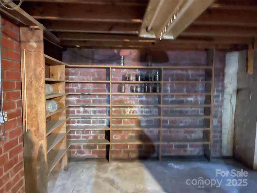 8725 Bringle Ferry Road, Salisbury, NC 28146.  MLS# CAR4218468, YatesRealty ID 1356. Basement shelving for your canned goods