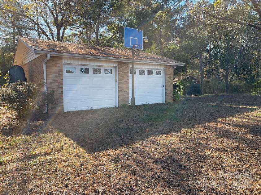8725 Bringle Ferry Road, Salisbury, NC 28146.  MLS# CAR4218468, YatesRealty ID 1356. Double detached brick garage