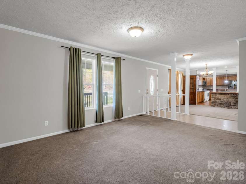 342 Lee Cudd Road, Rutherfordton, NC 28139.  MLS# CAR4344516, YatesRealty ID 13561. Living Room Opens to Dining/Kitchen