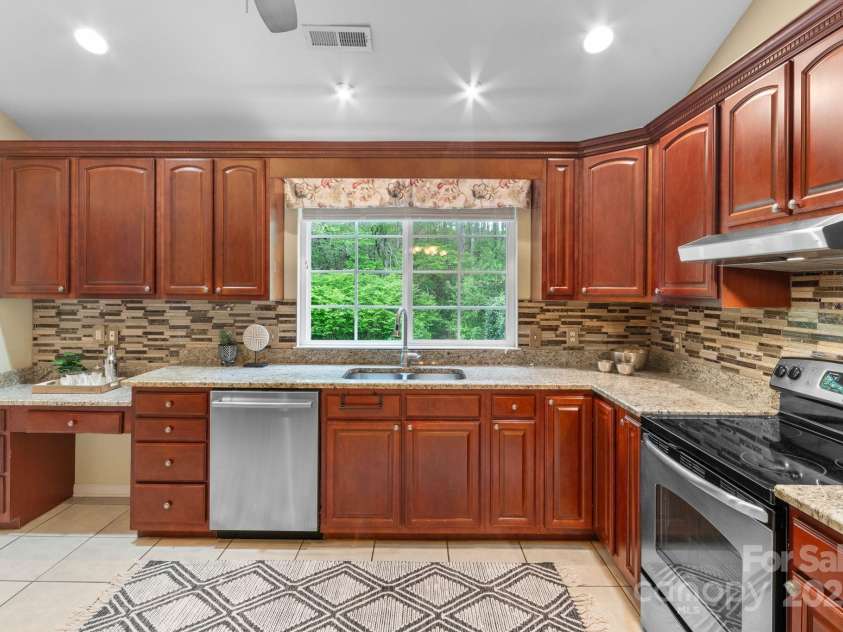 57 Stonebridge Drive, Asheville, NC 28805.  MLS# CAR4216613, YatesRealty ID 13561. 