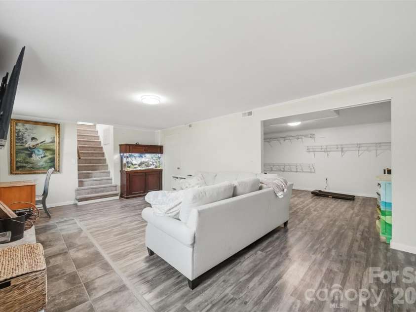 1730 Hamilton Street, Hickory, NC 28602.  MLS# CAR4368375, YatesRealty ID 13562. Basement den with adjacent flex room