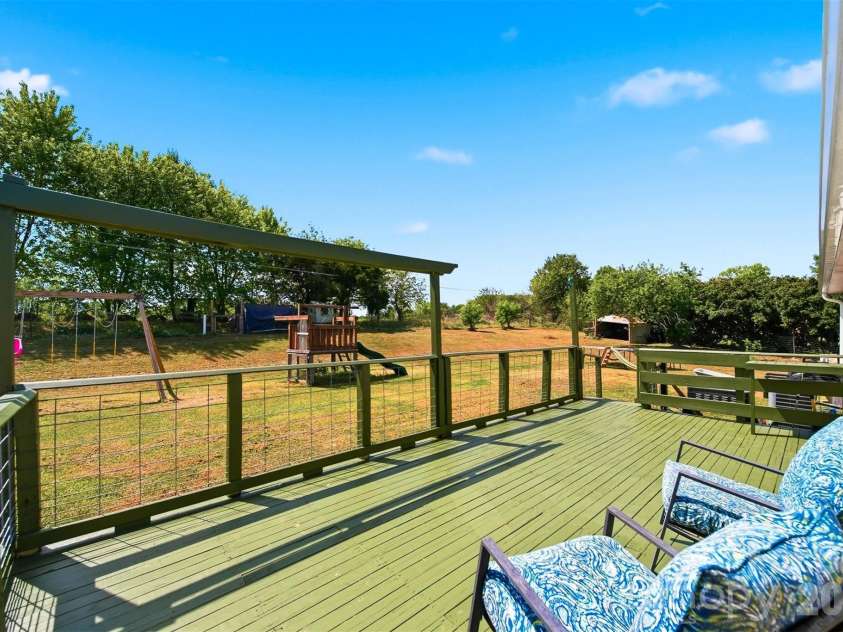 1730 Hamilton Street, Hickory, NC 28602.  MLS# CAR4368375, YatesRealty ID 13562. Expansive deck overlooking backyard