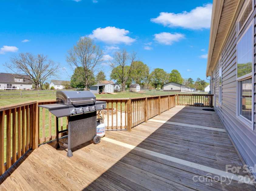 126 Top Flite Drive, Statesville, NC 28677.  MLS# CAR4245940, YatesRealty ID 13563. Back deck