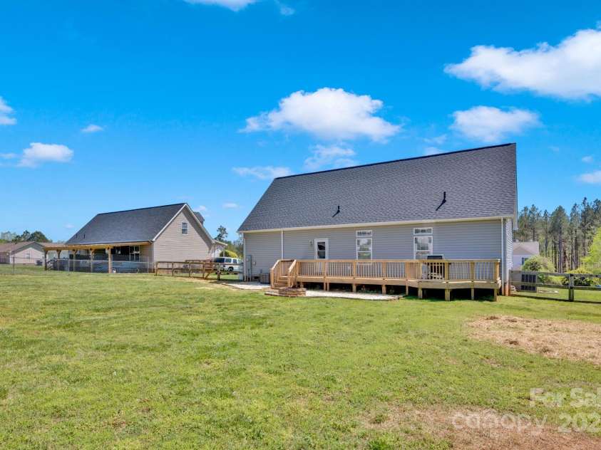 126 Top Flite Drive, Statesville, NC 28677.  MLS# CAR4245940, YatesRealty ID 13563. Backyard
