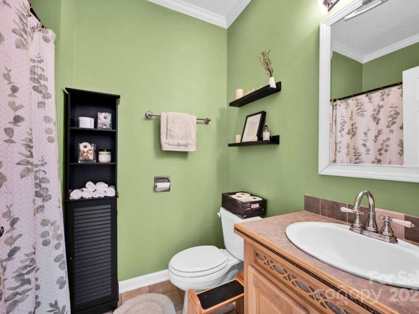 126 Top Flite Drive, Statesville, NC 28677.  MLS# CAR4245940, YatesRealty ID 13563. Full bathroom on main