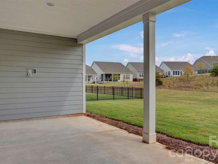 3023 Lake Como Drive, Monroe, NC 28110.  MLS# CAR4281950, YatesRealty ID 1357. Covered Lanai