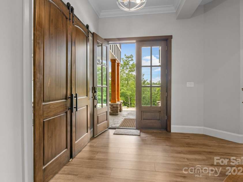 5360 Low Country Road, Lenoir, NC 28645.  MLS# CAR4252044, YatesRealty ID 1357. View from foyer to the front door entrance