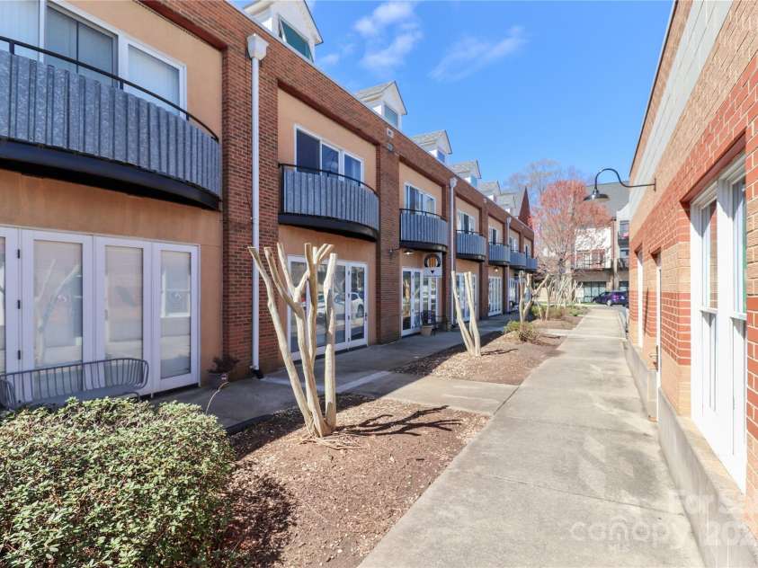 452 Main Street, Davidson, NC 28036.  MLS# CAR4233855, YatesRealty ID 13570. Back of building